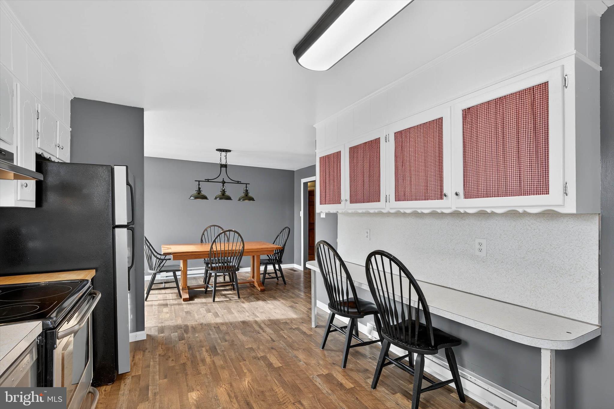 421 Million Dollar Road Halifax, PA 17032 - Photo 9 of 39 a dining room with furniture and wooden floor