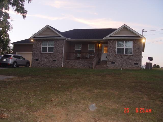 1360 McCool Road Lewisburg, TN 37091 - Photo 2 of 27 a front view of a house with garden
