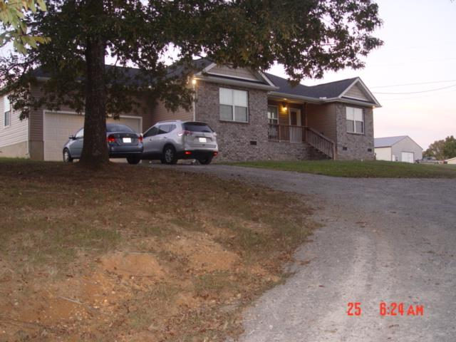 1360 McCool Road Lewisburg, TN 37091 - Photo 3 of 27 a view of a house with a yard