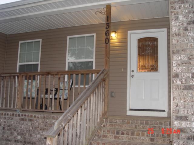1360 McCool Road Lewisburg, TN 37091 - Photo 4 of 27 a view of entryway with a front door and wooden floor