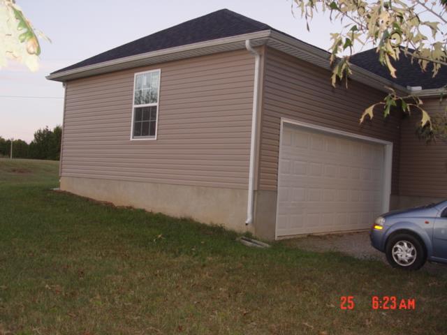 1360 McCool Road Lewisburg, TN 37091 - Photo 5 of 27 a view of a house with a yard