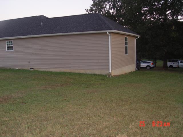 1360 McCool Road Lewisburg, TN 37091 - Photo 6 of 27 a view of a backyard of the house