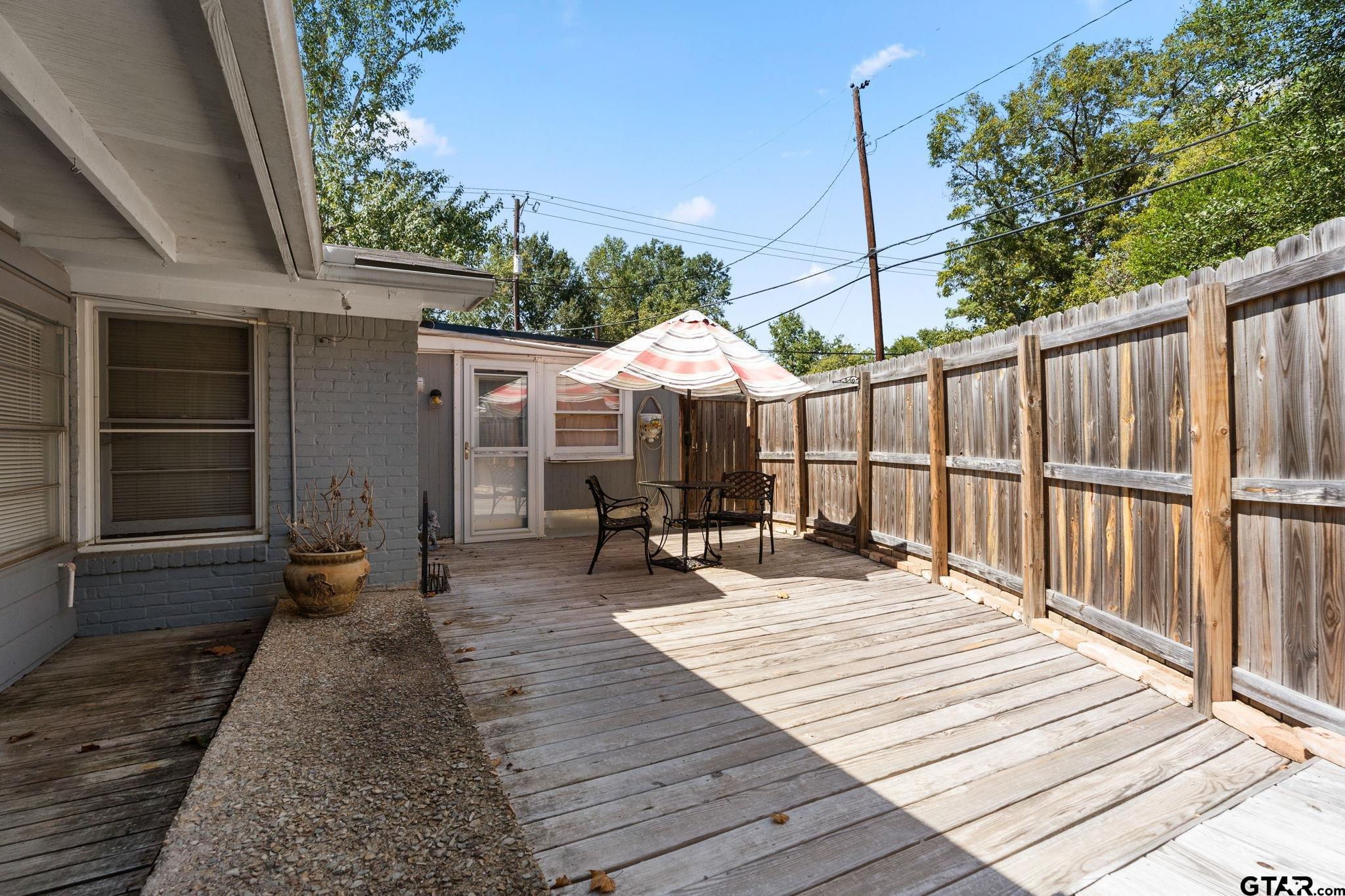 2904 New Copeland Road Tyler, TX 75701 - Photo 20 of 28 a view of house with wooden floor outdoor seating area