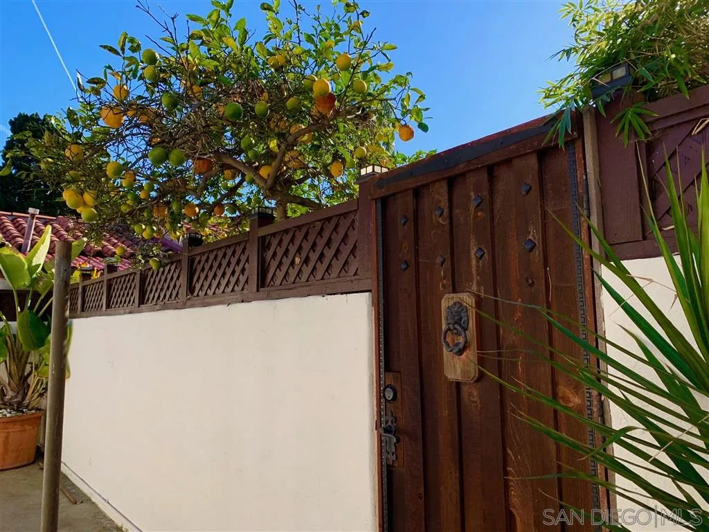 428 G Avenue Coronado, CA 92118 - Photo 15 of 18 a view of outdoor space with wooden fence