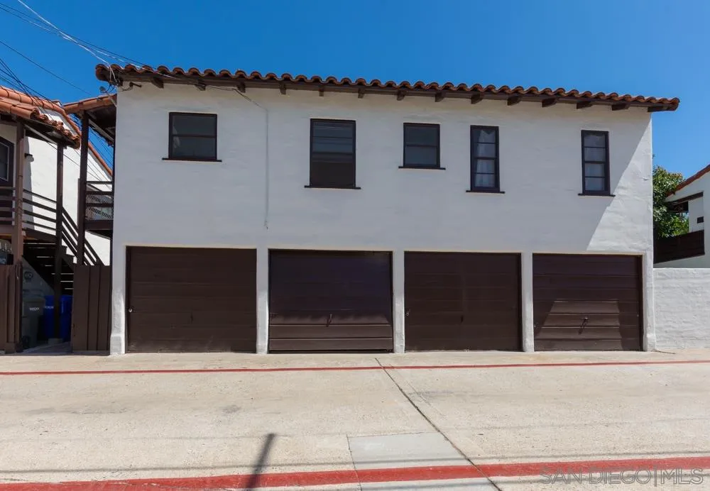 428 G Avenue Coronado, CA 92118 - Photo 18 of 18 a house that has a glass door