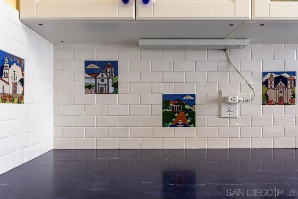 428 G Avenue Coronado, CA 92118 - Photo 5 of 18 a view of a utility room with wooden floor