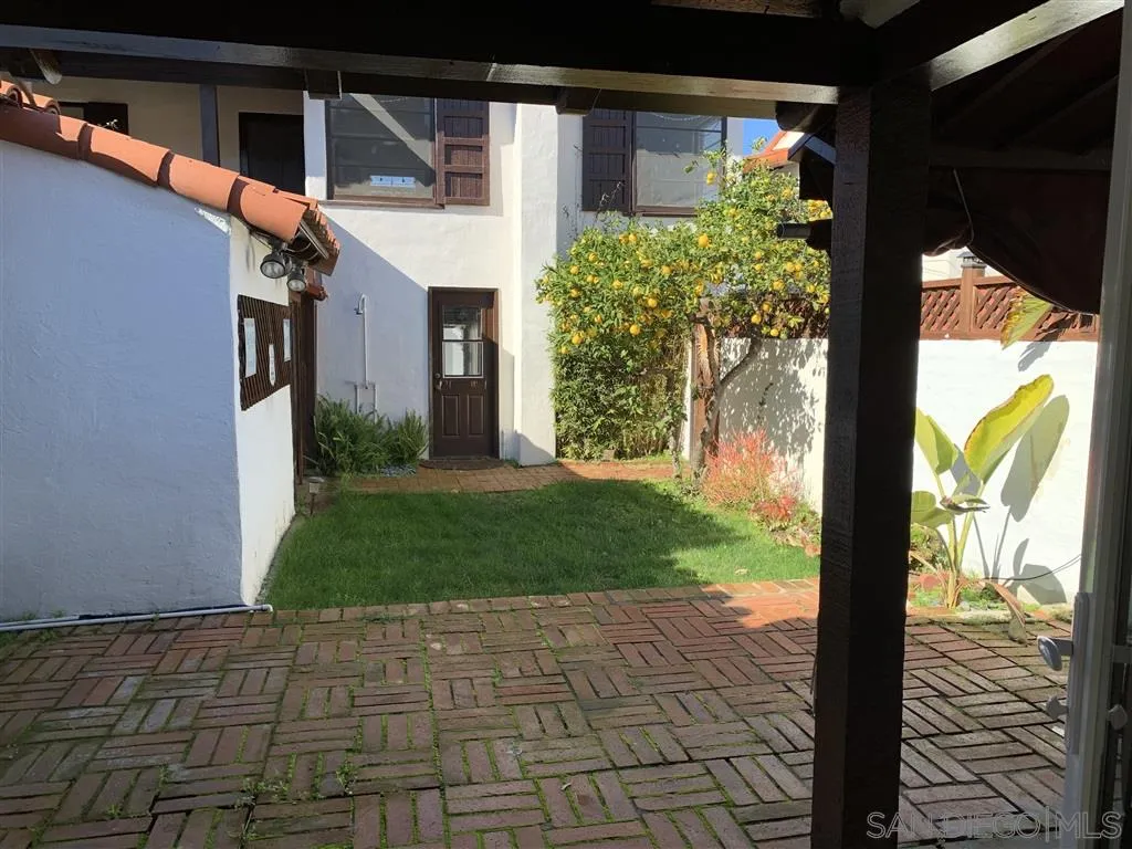 428 G Avenue Coronado, CA 92118 - Photo 9 of 18 a view of a house with a yard