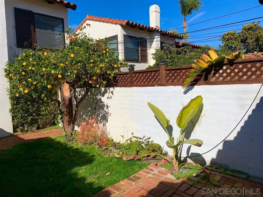 428 G Avenue Coronado, CA 92118 - Photo 10 of 18 a front view of a house with garden