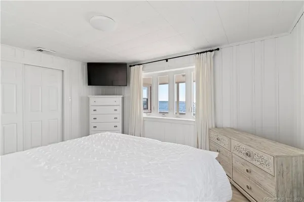 a kitchen with counter top and windows