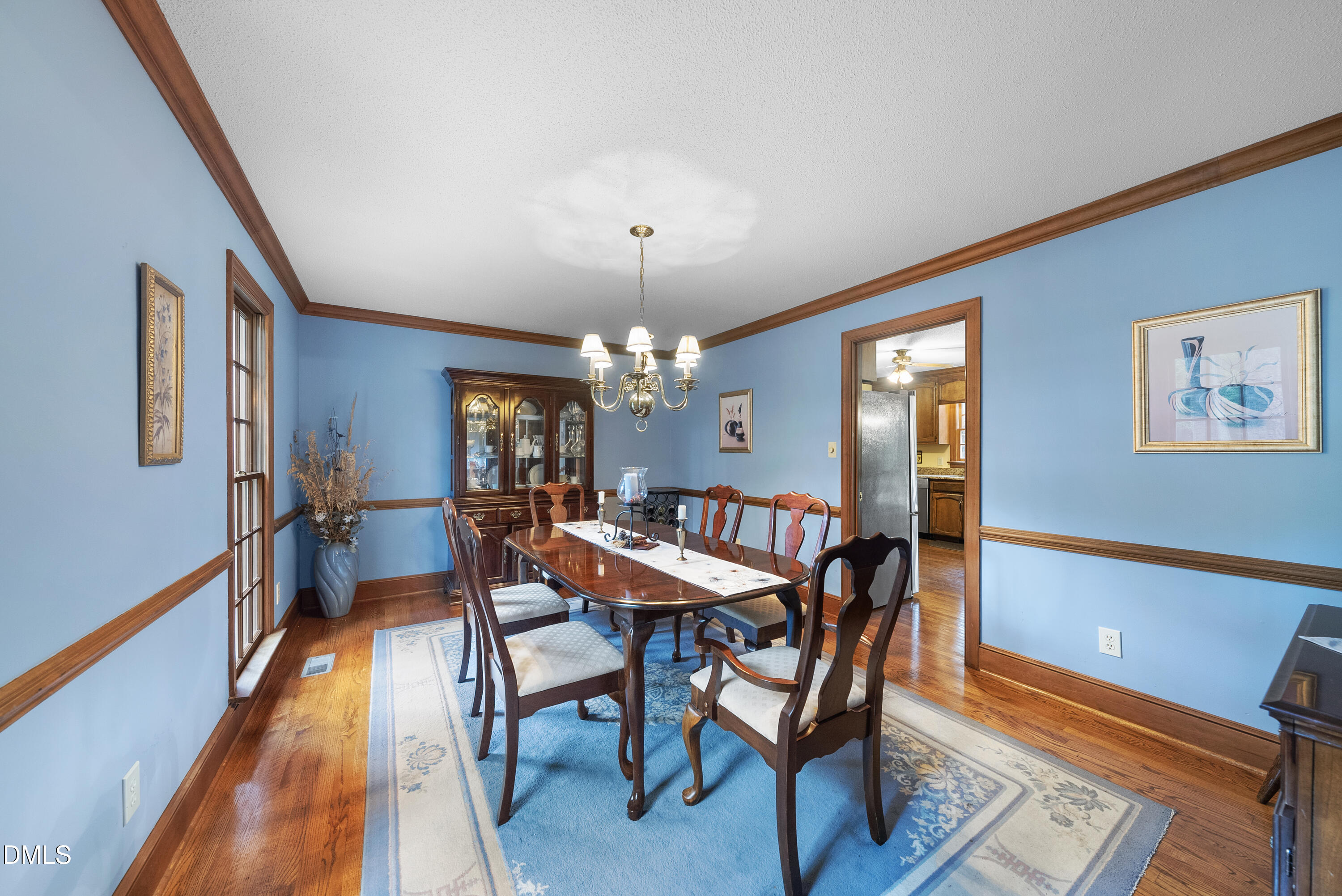 717 Misty Isle Place Raleigh, NC 27615 - Photo 16 of 59 Imagine Holiday dinners in this generous Dining room with new light paint