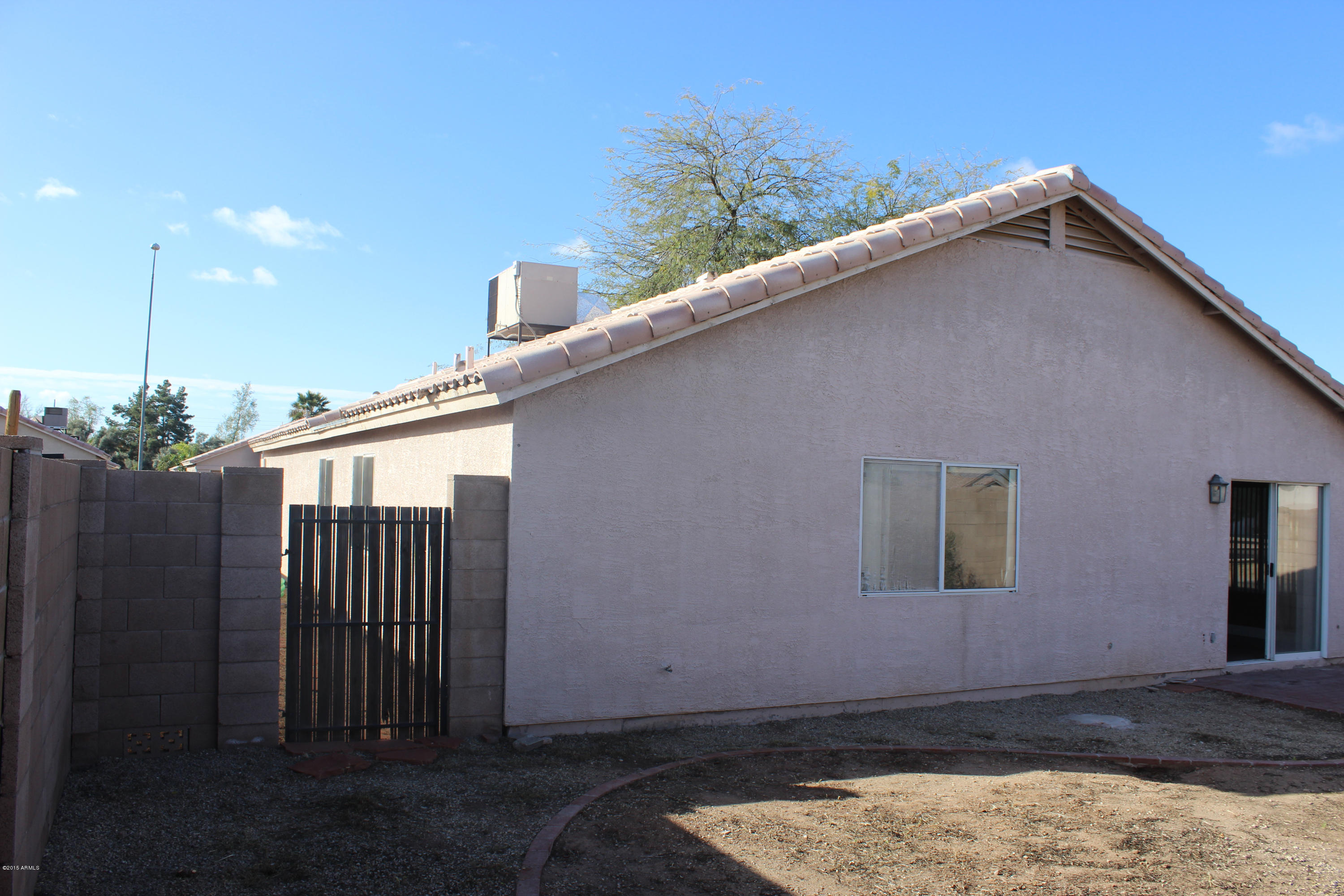5028 Casper Road Mesa, AZ 85205 - Photo 30 of 33 a backyard of a house with lots of green space