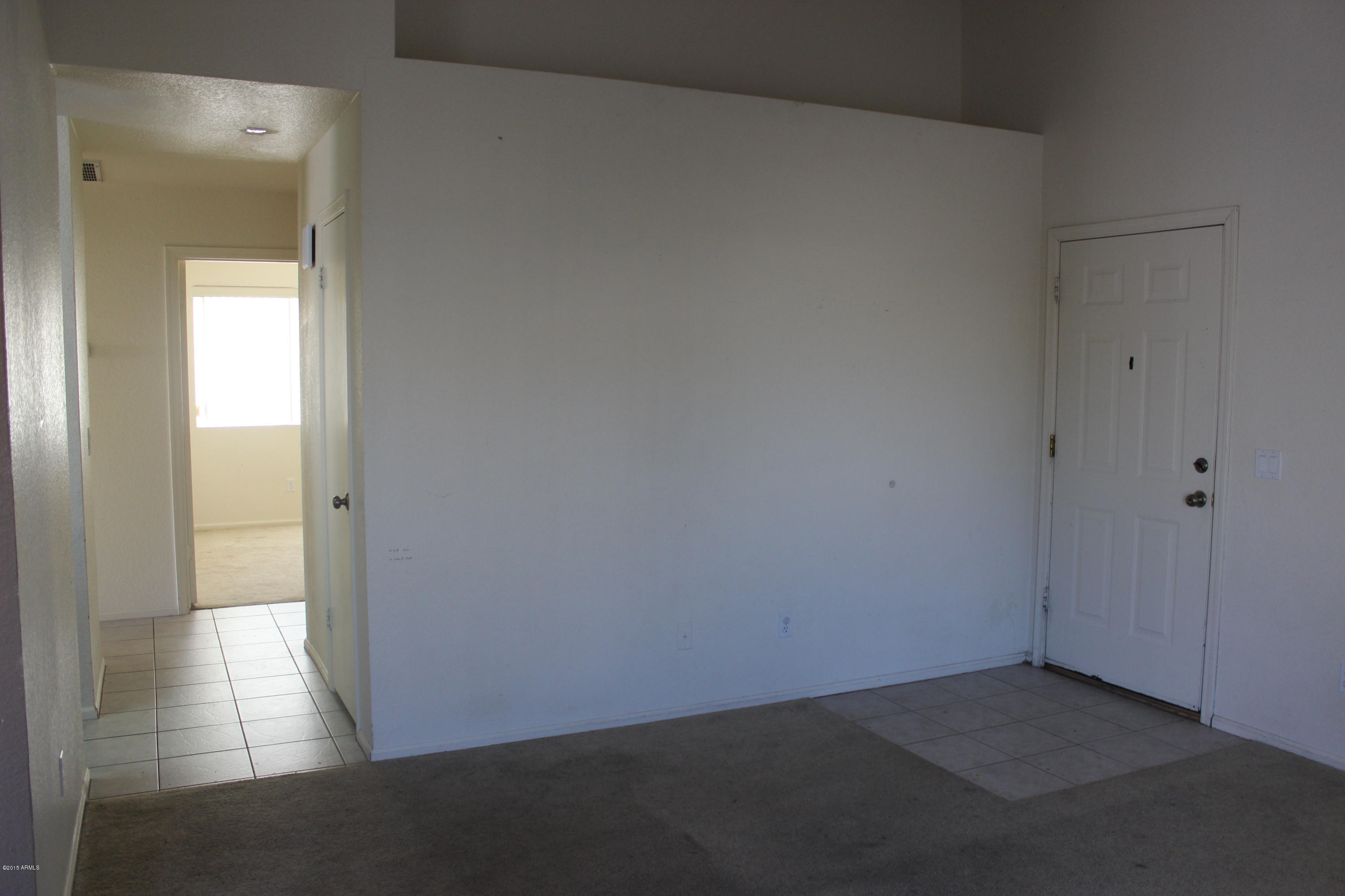 5028 Casper Road Mesa, AZ 85205 - Photo 6 of 33 an empty room with windows
