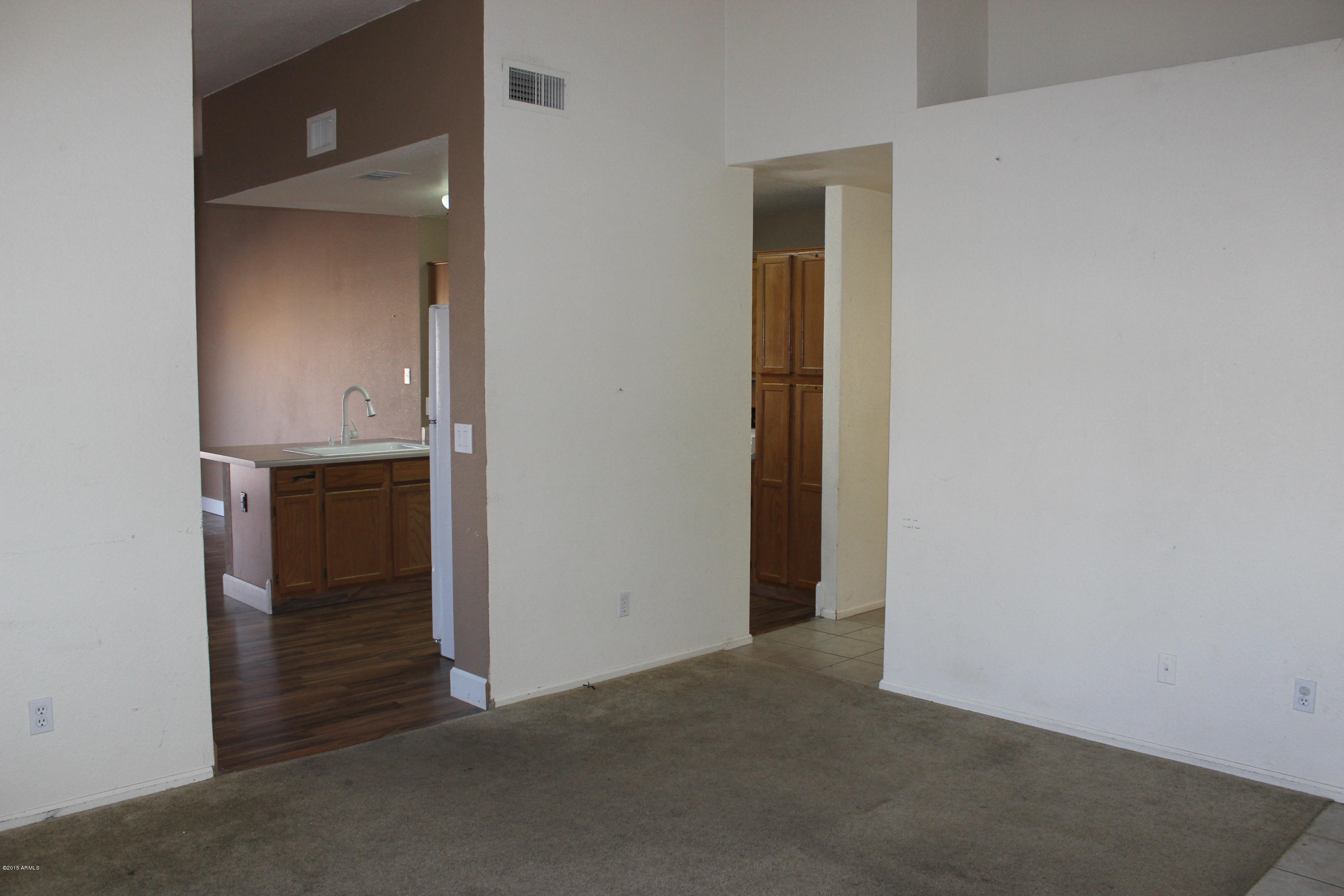 5028 Casper Road Mesa, AZ 85205 - Photo 7 of 33 an empty room and fire place