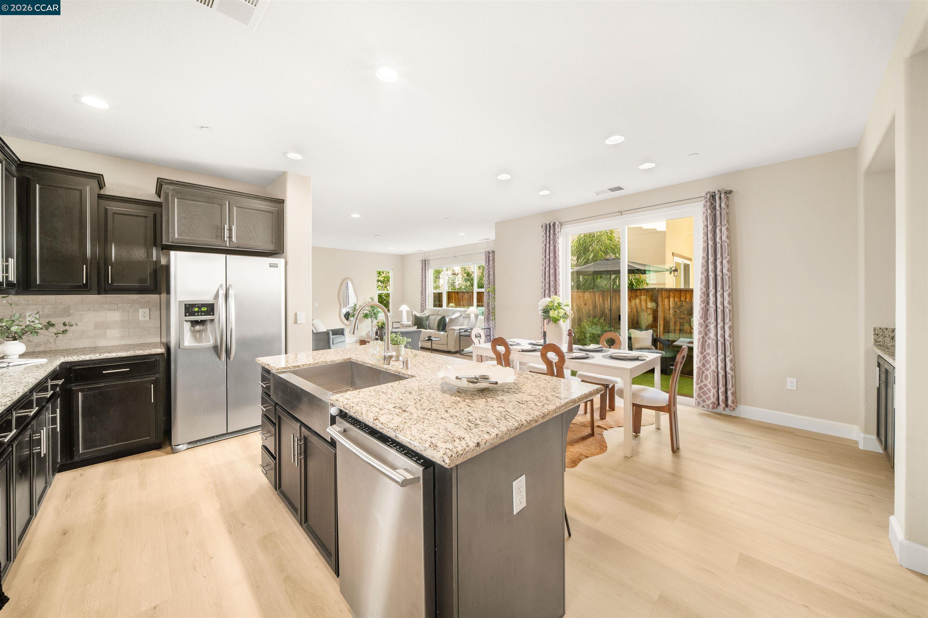 2026 Poinsettia Street San Ramon, CA 94582 - Photo 9 of 26 a kitchen with a sink stove and refrigerator