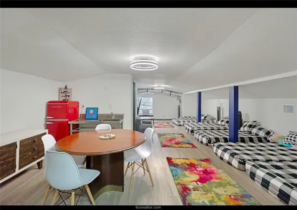 a bathroom with a sink and a shower curtain