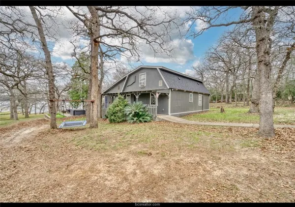 a front view of a house with a porch