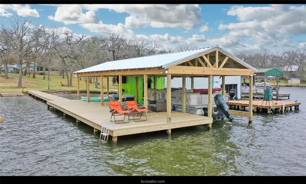 a view of a yard with an outdoor space