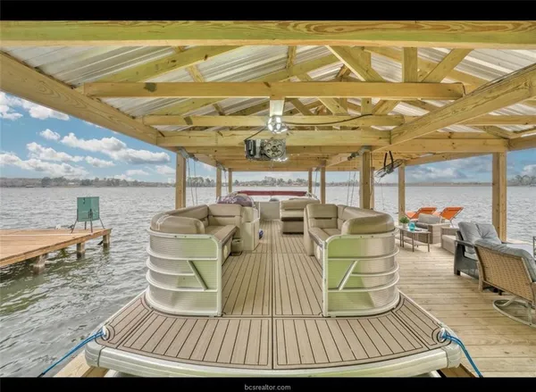 a living room with a table and chairs