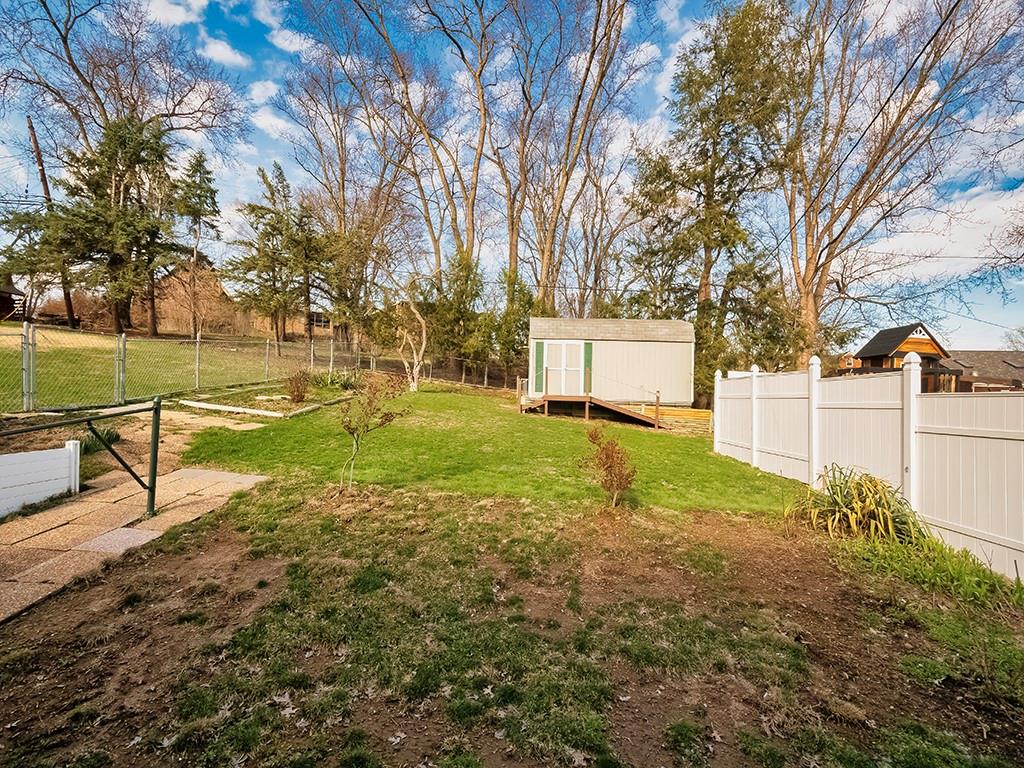 345 Rockhill Road Pittsburgh, PA 15243 - Photo 29 of 32 The front part of the yard is ideal for gardening. The shed is 10x20 - built in 2016, has electricity and new steps & ramp! Great for a workshop, hobbies or extra storage! There is a small walkway along the inside of the privacy fence on the right for taking the lawn mower to front of the yard.