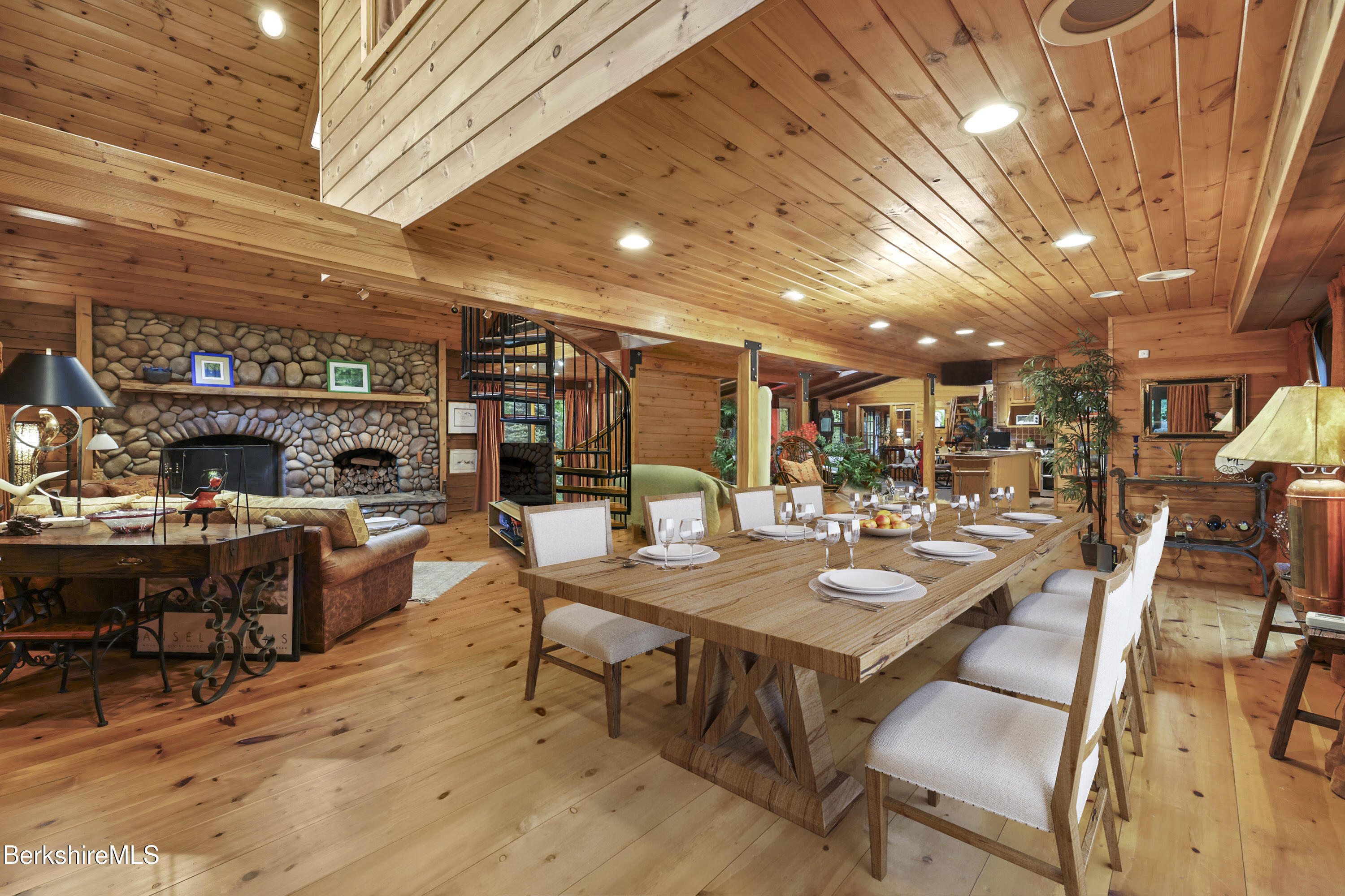 236 Surriner Road Becket, MA 01223 - Photo 17 of 45 a view of a dinning table and chairs in the patio