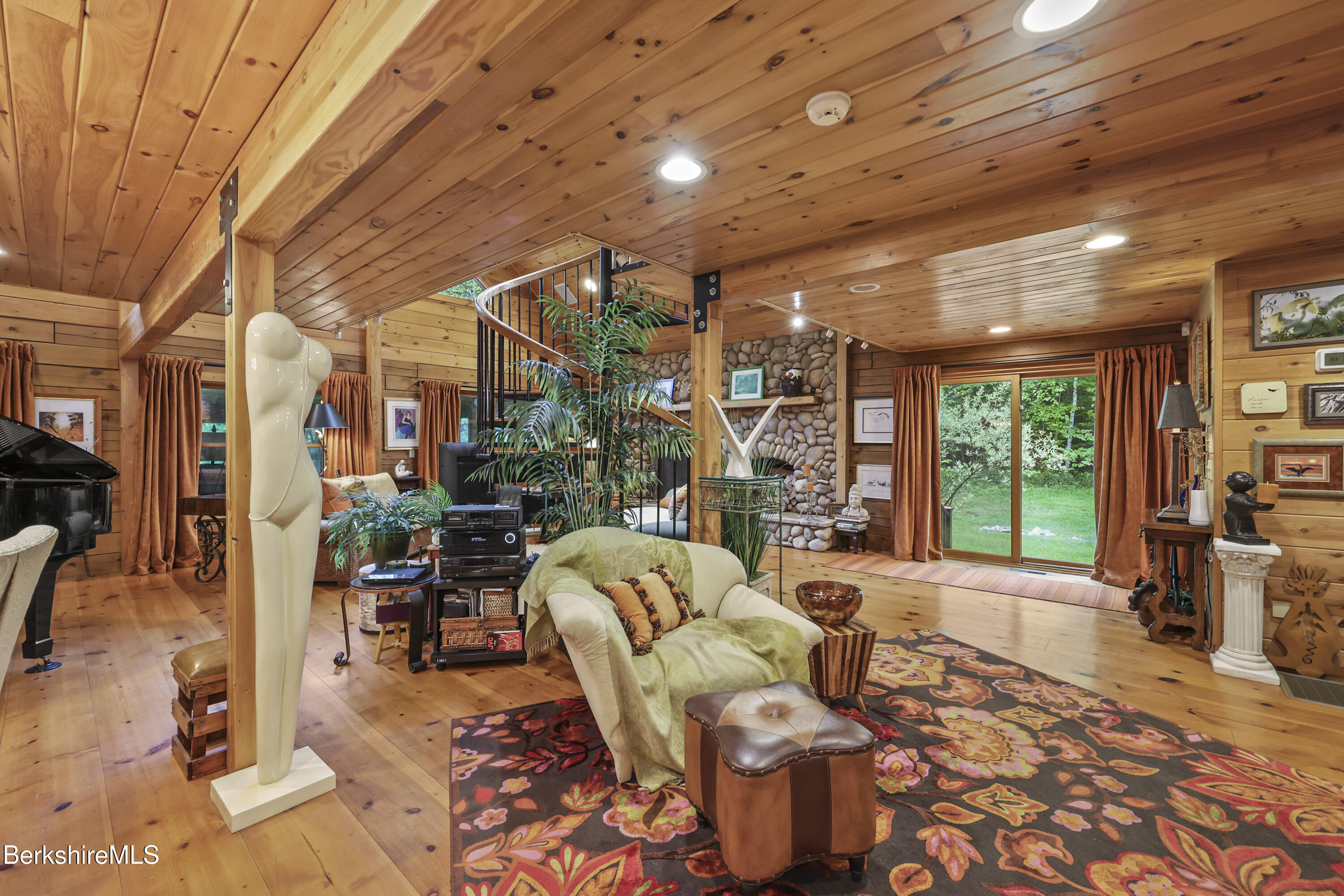 236 Surriner Road Becket, MA 01223 - Photo 23 of 45 a living room with furniture a large window with outer view