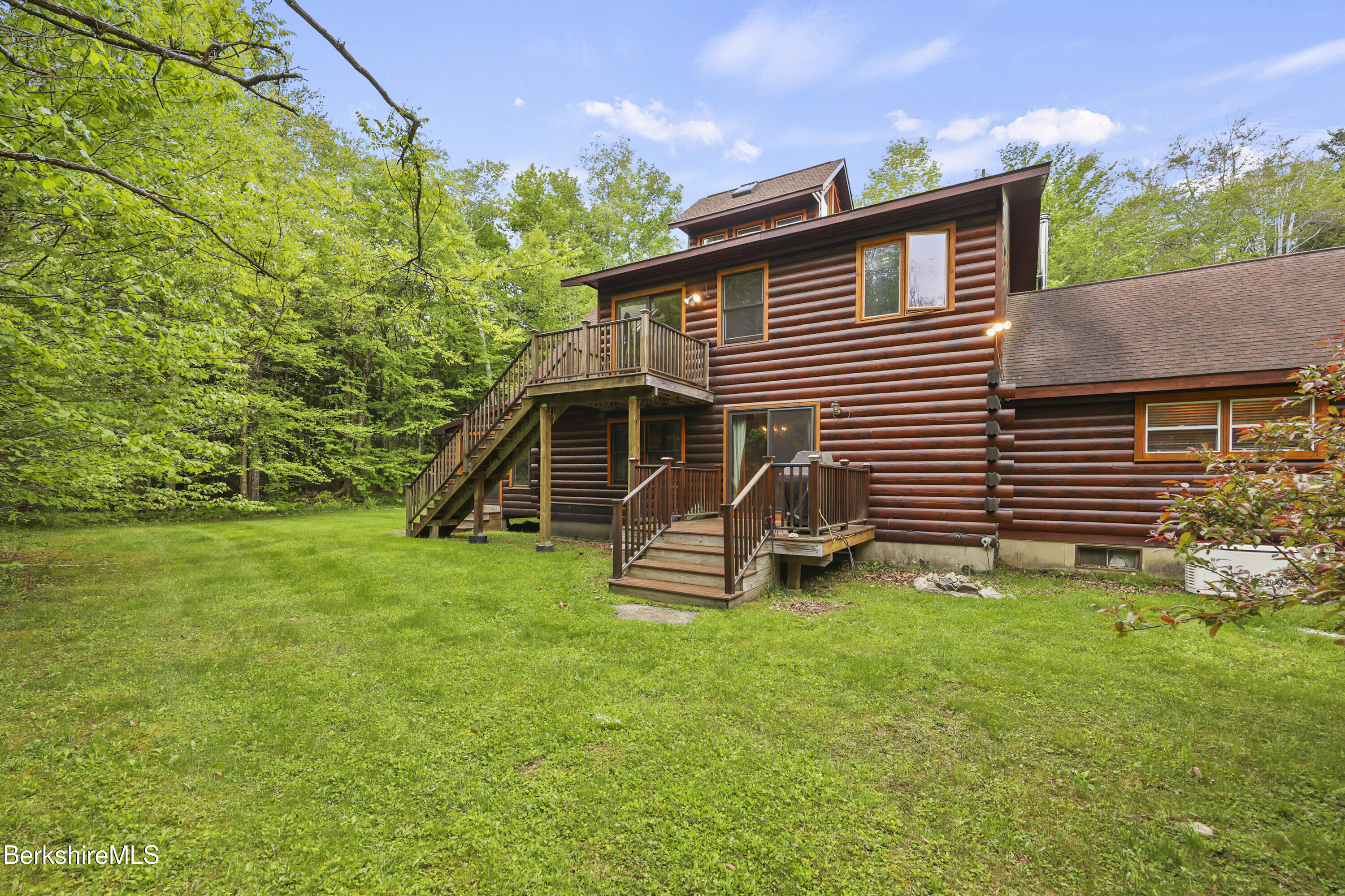 236 Surriner Road Becket, MA 01223 - Photo 44 of 45 a view of a house with a yard