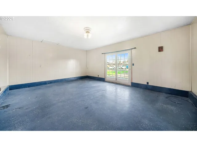 a view interior of a house a ceiling fan and window
