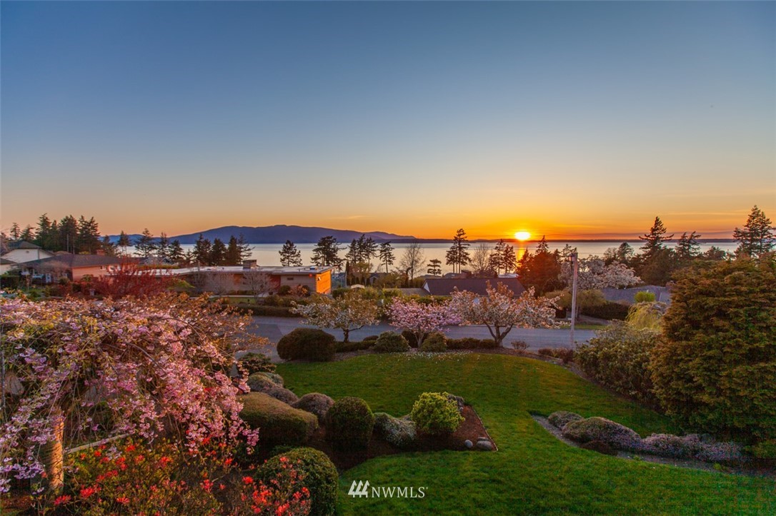 609 Briar Road Bellingham, WA 98225 - Photo 4 of 40 a view of a lake with a city