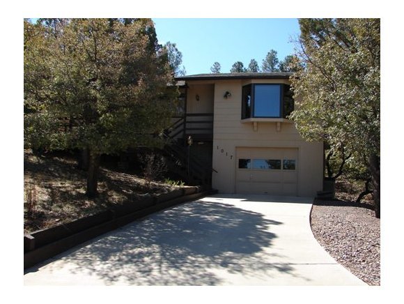1017 Forest Hylands Road, Unit 1 Prescott, AZ 86303 - Photo 1 of 6 a view of a house with a yard