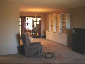 1017 Forest Hylands Road, Unit 1 Prescott, AZ 86303 - Photo 2 of 6 a living room with furniture and a large window