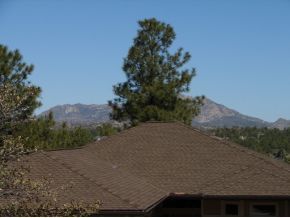 1017 Forest Hylands Road, Unit 1 Prescott, AZ 86303 - Photo 6 of 6 a view of a road with mountains in the background