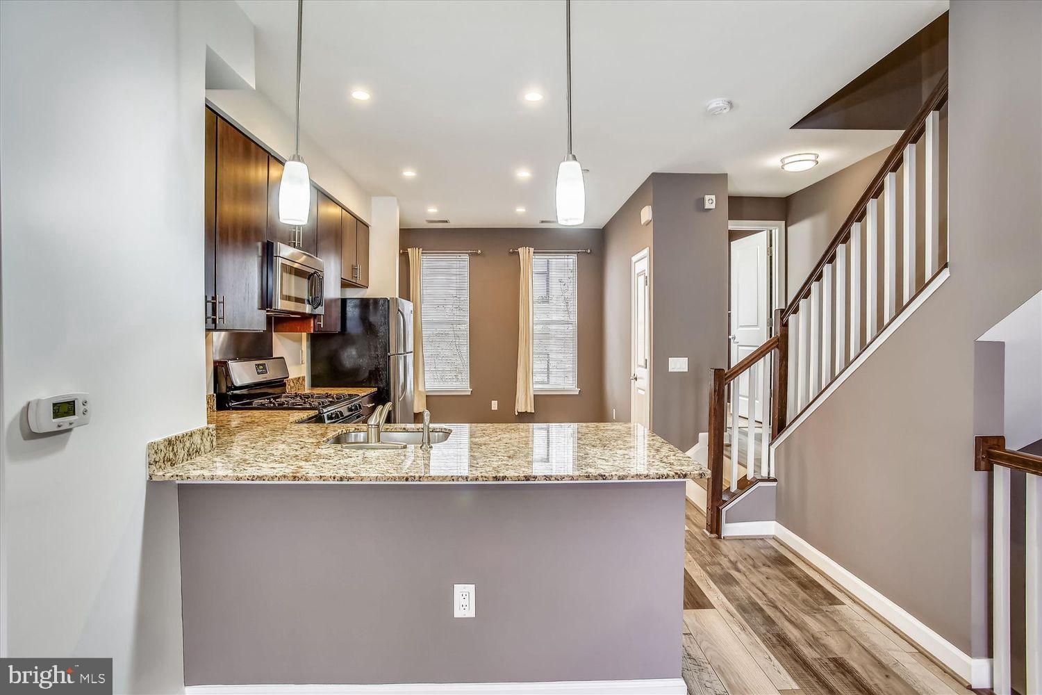 2526 Sheridan Road Southeast Washington, DC 20020 - Photo 11 of 24 Modern kitchen with sleek finishes.