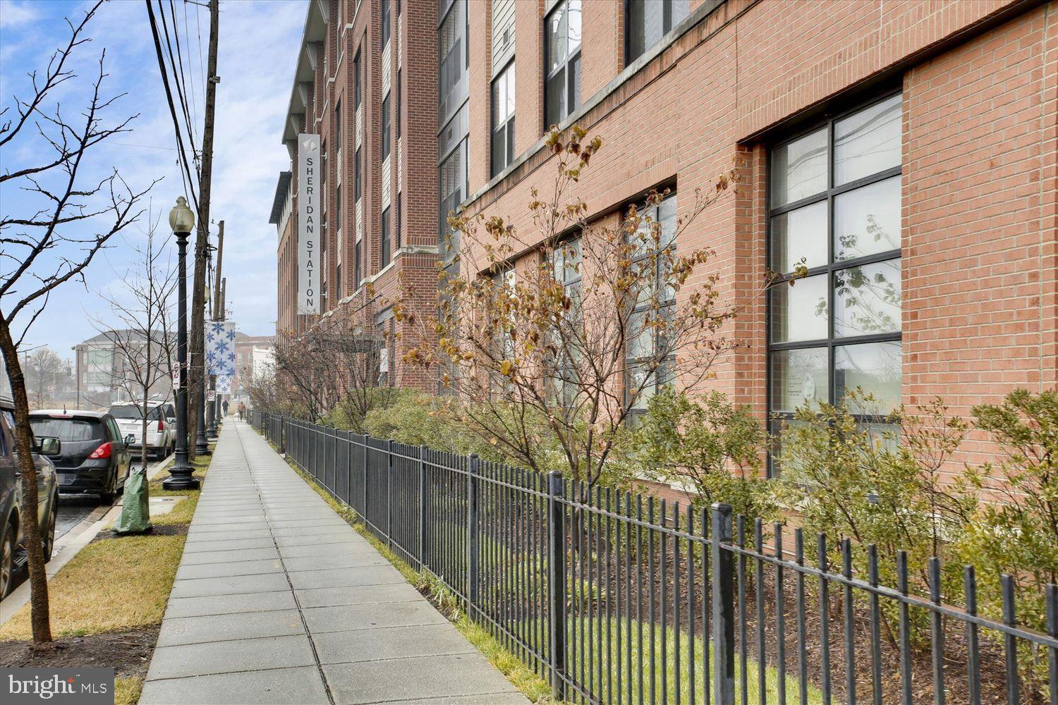 2526 Sheridan Road Southeast Washington, DC 20020 - Photo 2 of 24 Charming urban walkway by modern brick building.