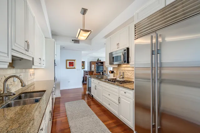 a view of a balcony with furniture