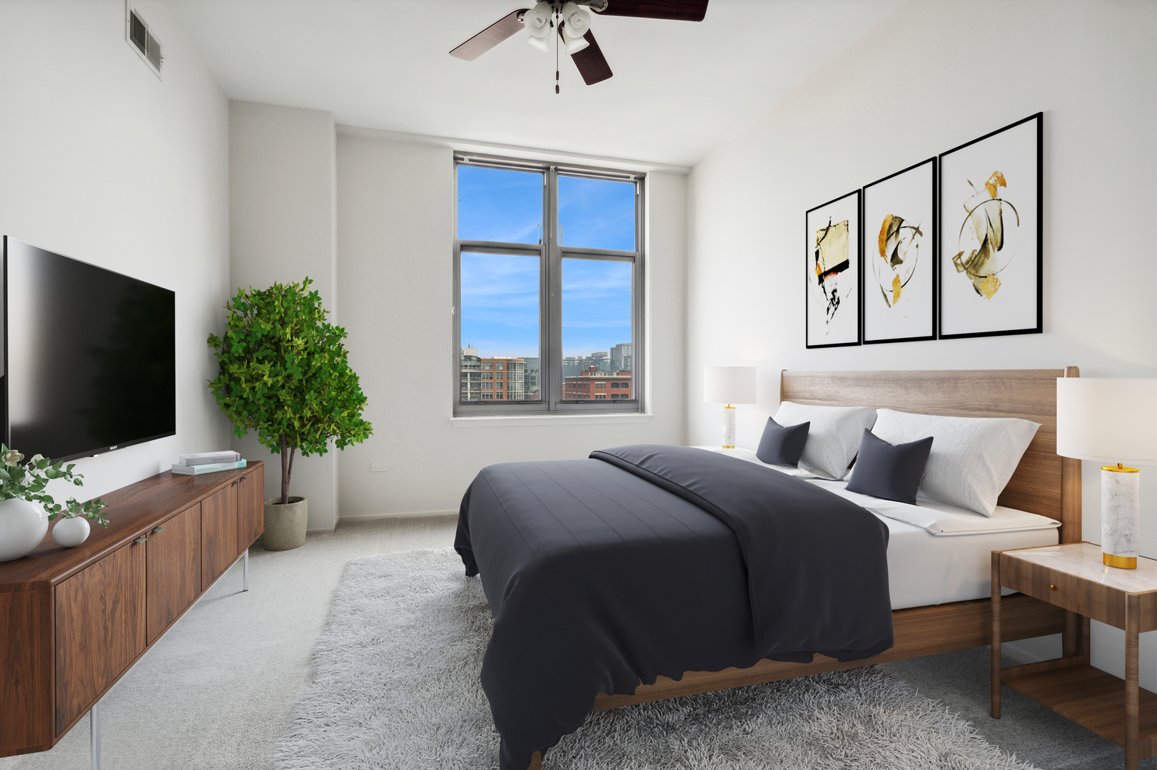 1201 West Adams Street, Unit 701 Chicago, IL 60607 - Photo 13 of 29 a bedroom with a bed and a flat screen tv