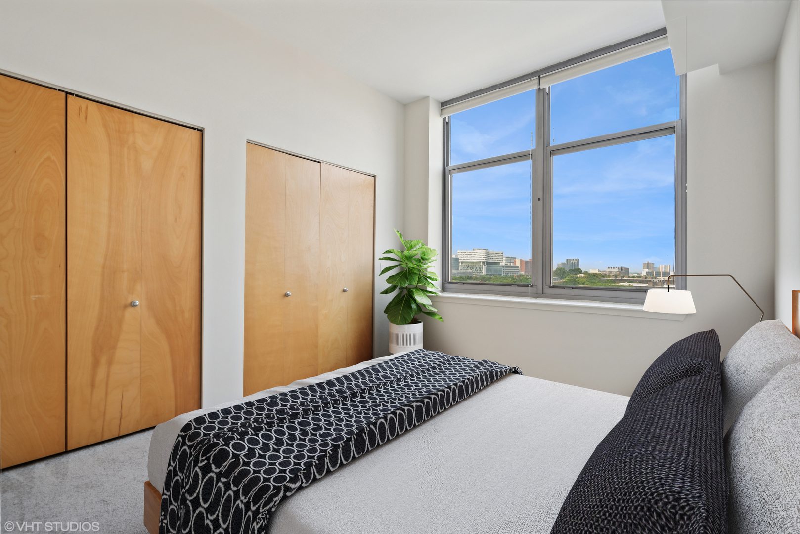 1201 West Adams Street, Unit 701 Chicago, IL 60607 - Photo 24 of 29 a bedroom with a bed and a window