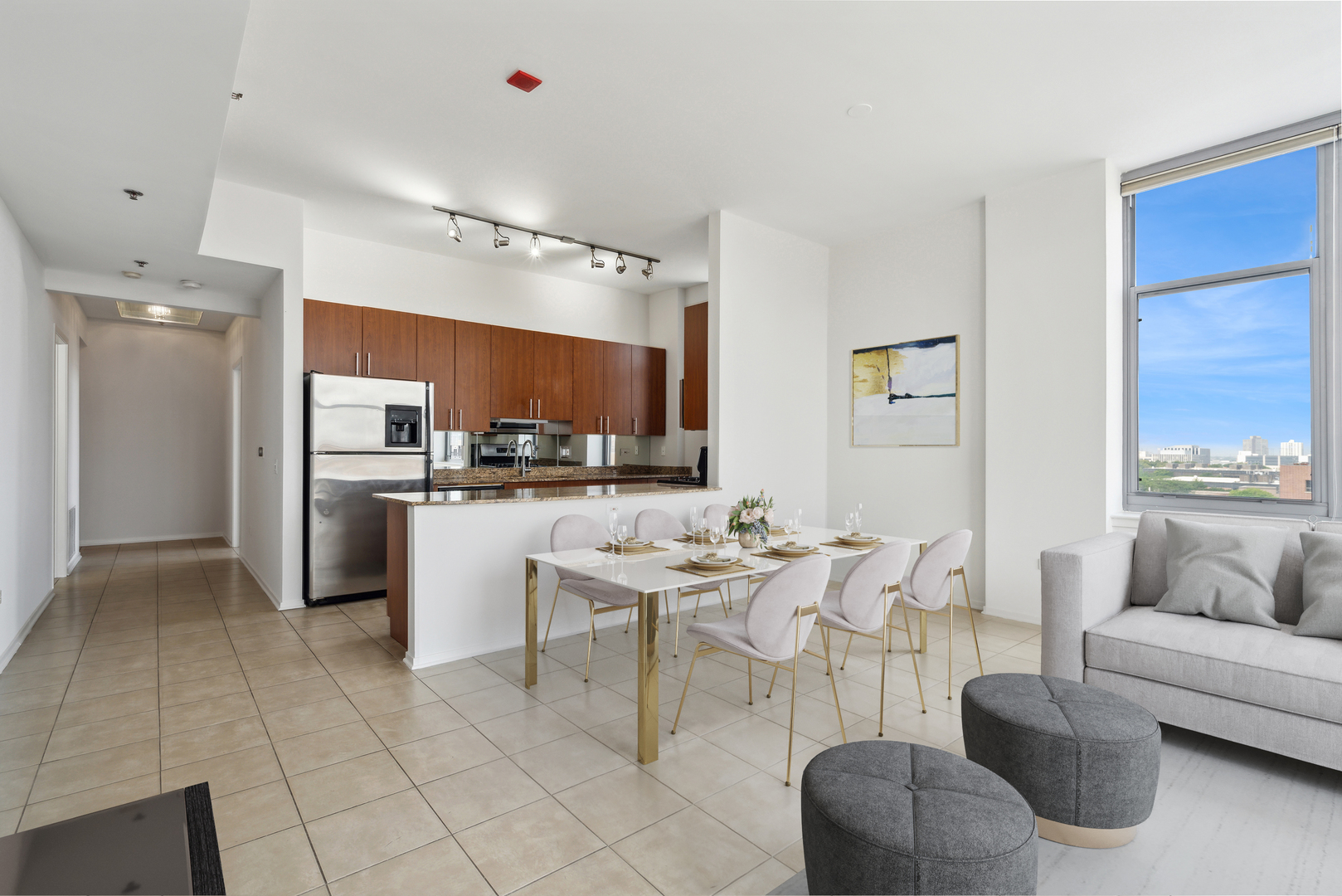 1201 West Adams Street, Unit 701 Chicago, IL 60607 - Photo 10 of 29 a living room with stainless steel appliances kitchen island granite countertop furniture and a kitchen view