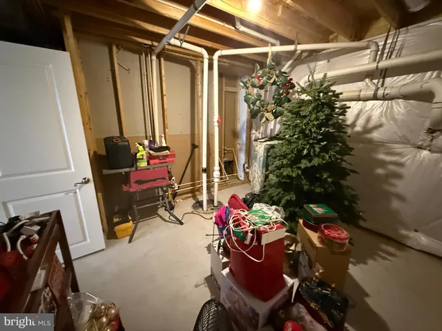 a kitchen with a stove and a refrigerator