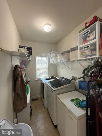 a view of a kitchen with a sink and a yard