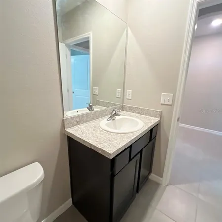 a bathroom with a sink and a toilet
