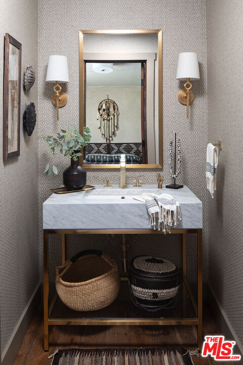 243 Taos Road Altadena, CA 91001 - Photo 16 of 32 a bathroom with a sink and a mirror