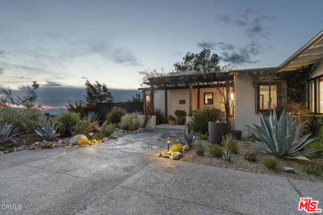 243 Taos Road Altadena, CA 91001 - Photo 2 of 32 a view of a house with backyard and sitting area