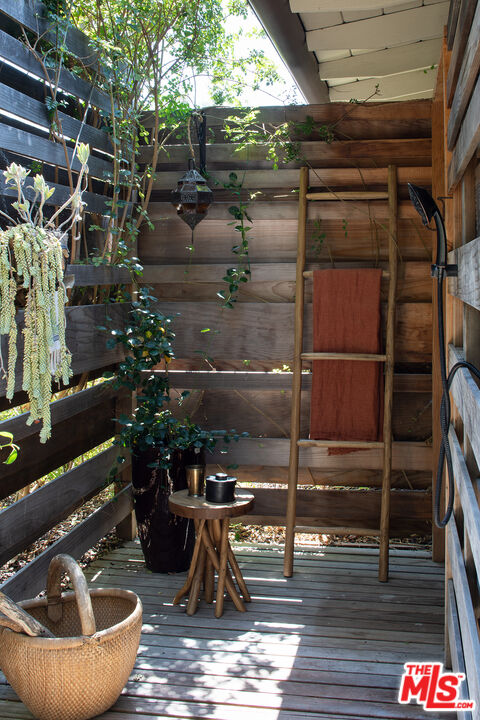 243 Taos Road Altadena, CA 91001 - Photo 23 of 32 a room with water heater and wooden walls