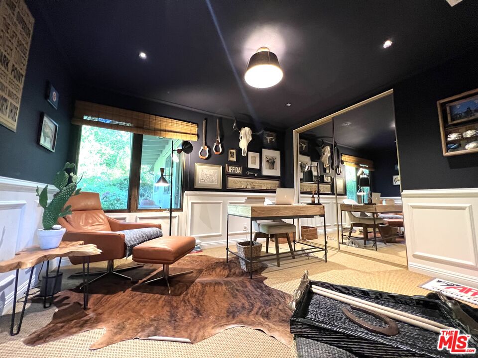 243 Taos Road Altadena, CA 91001 - Photo 25 of 32 a living room with lots of furniture and a large window