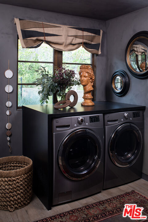 243 Taos Road Altadena, CA 91001 - Photo 26 of 32 a bathroom with a toilet and a large window