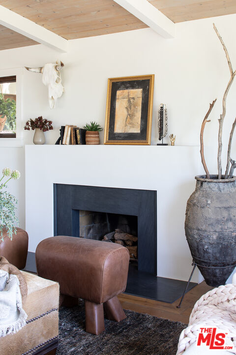 243 Taos Road Altadena, CA 91001 - Photo 4 of 32 a living room with furniture and a fireplace