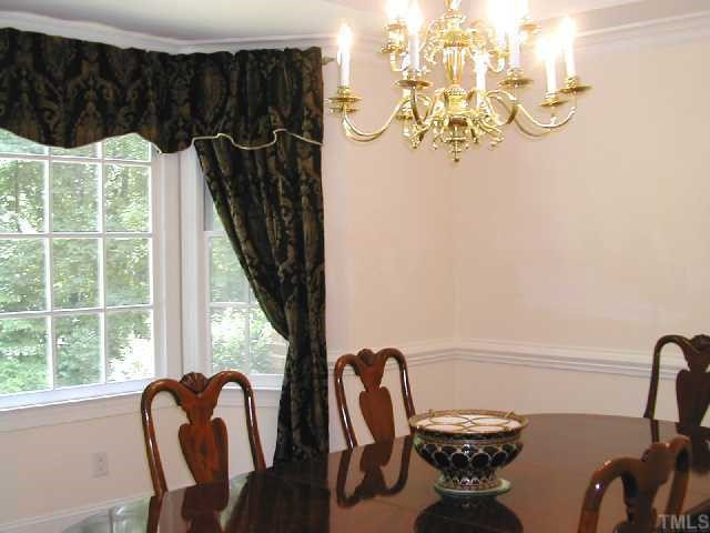 10309 Roadstead Way West Raleigh, NC 27613 - Photo 3 of 12 Dining Room w/Bay Window & Hardwood Floor