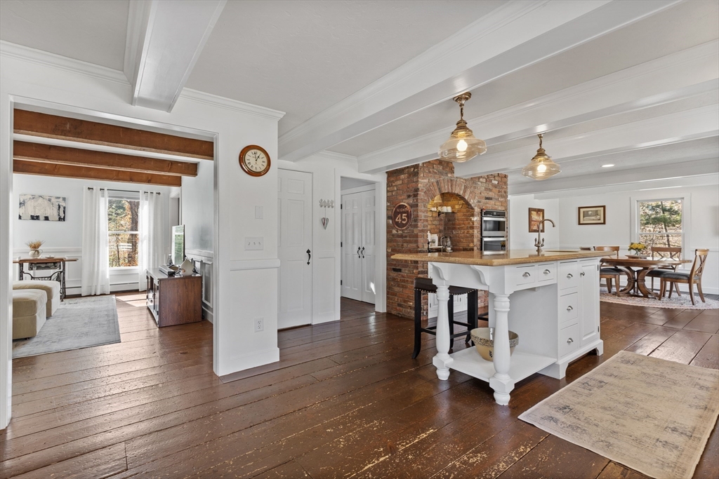 57 Whitewood Road Milford, MA 01757 - Photo 2 of 40 a living room with furniture and wooden floors