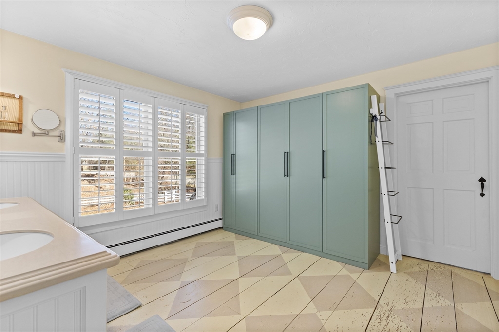 57 Whitewood Road Milford, MA 01757 - Photo 21 of 40 a view of an empty room with a window