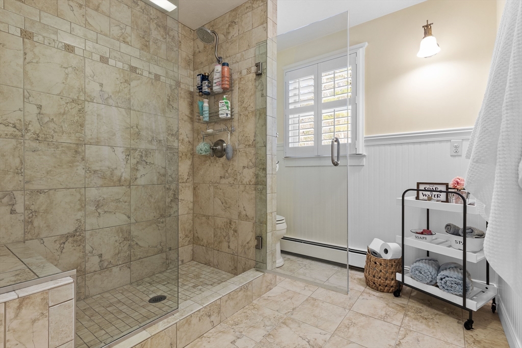 57 Whitewood Road Milford, MA 01757 - Photo 22 of 40 a bathroom with a shower